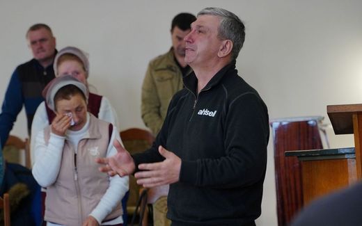 Emotions during a sermon in in Strumok, southern Ukraine. Photo KOEH