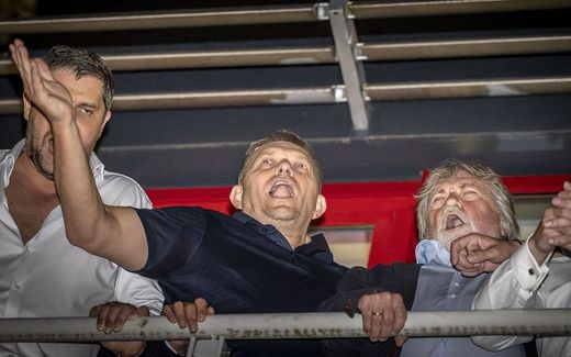 Smer-SSD party leader and Slovakia's former Primer Minister Robert Fico (2nd L) celebrates his victory in the general elections alongside party members at the party's headquarters in Bratislava. Photo AFP, Tomas Benedikovic