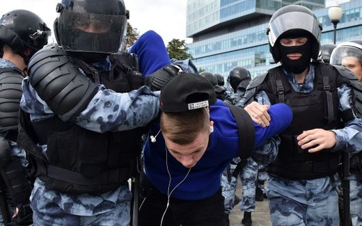 Servicemen arresting somebody. Photo not related with content. Photo AFP, Vasily Maximov
