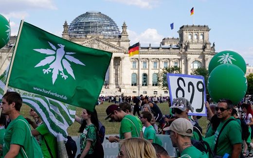 People take part in the Cannabis Parade (Hanfparade) in front of the Reichstag building in Berlin, Germany. The Cannabis Parade is a demonstration to support the legalization of soft drugs. Photo EPA, Alexander Becher