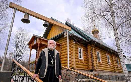 Georgy Edelshtein in front of a church in the Kostroma region in Russia. Photo AFP, Yuri Kadobnov