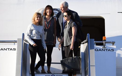 US Vice President Mike Pence with wife Karen and daughters Charlotte (left) and Audrey (right), talk as they board an aircraft in 2017. Photo EPA, Paul Miller