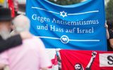 Pro Israel activists hold a banner reading 'Against Anti-Semitism and hate of Israel'. Anti-Semitism is especially present in Eastern Germany. It can be traced back partly to the anti-Semitic attitude of the German Democratic Republic. Photo EPA, Hannibal Hanschke