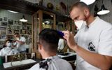 A Montenegrin barber in the city of Podgorica. photo AFP, Savo Prevelic