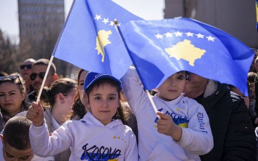 Children waving Kosovo's flag. Photo AFP, Armend Nimani

