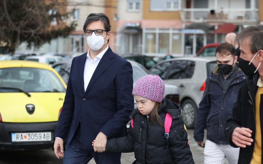 North Macedonian President walks Down girl to school  