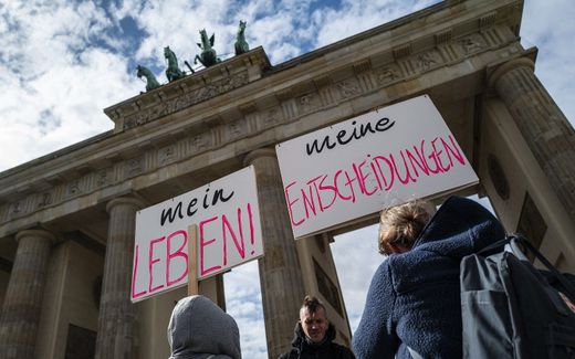Protesters display placards reading: "My life, my choice" during a pro-choice counter demonstration coinciding with the annual anti-abortion "March for Life" in front of the Brandenburg Gate in Berlin. Photo AFP, John Macdougall
