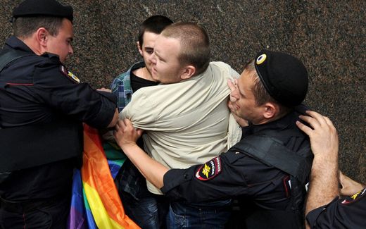 Russian riot policemen detain a gay and LGBT rights activist during an unauthorized gay rights activists rally in cental Moscow. Photo AFP, Kirill Kudryatvtsev