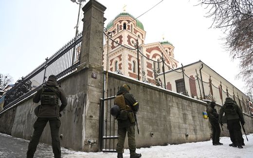 Ukrainian servicemen searching Orthodox premises in the western city of Lviv. The Orthodox church that is connected with the Moscow Patriarchate is under suspicion supporting the Russian ideology. Photo AFP, Yuriy Dyachyshyn
