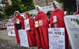 Italian political parties Lega, Fratelli d'Italia, feminist associations and associations in defense of the family are protesting against a fertility fair with placards such as 'Children they cannot be bought' and 'Women are not wombs to be rented'. Photo EPA, Matteo Corner