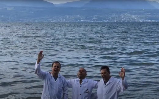 Baptismal ritual in Lake Geneva. Still YouTube