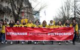 Demonstrators hold a banner reading "euthanasia, hypocritical oath" in reference to the Hippocratic Oath during a March for Life, against abortion and euthanasia. Photo AFP, Julien de Rosa
