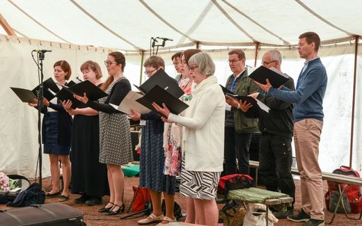 Singing during a church service of the Evangelical Lutheran Mission Diocese of Finland. Photo Facebook, Suomen evankelisluterilainen lähetyshiippakunta