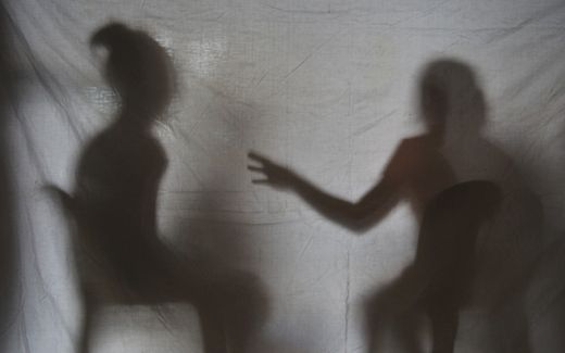 The shadow of girls rescued from a cyber sex den are seen in this photo taken at Preda Foundation office. The girls were forced to produce pornography online. Photo AFP, Ted Aljibe 