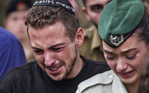 Comrades of French-Israeli soldier Eli Valentin Ghenassia, who was killed in combat at Kibbutz Beeri during an infiltration by Hamas militans, mourn during his funeral. Photo AFP, Ronaldo Schemidt