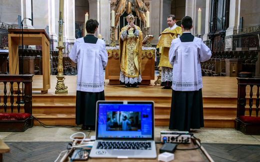 French worship service which is broadcast on a livestream. Photo EPA, Christophe Petit Tesson