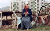 For three years, the city of Sarajevo was besieged before peace came. Also, after the Dayton Agreement in November 1995, peacemakers were not really popular. Photo: a woman knitting at the ruins of Sarajevo just before the peace deal. Photo AFP, Odd Andersen