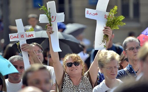 How do you measure persecution of Christians? Open Doors tries that but the method of that research is under constant questioning. On the photo: protest against persecution of Christians in Lyon, France, in July, 2014. Photo AFP, Romain Lafabregue