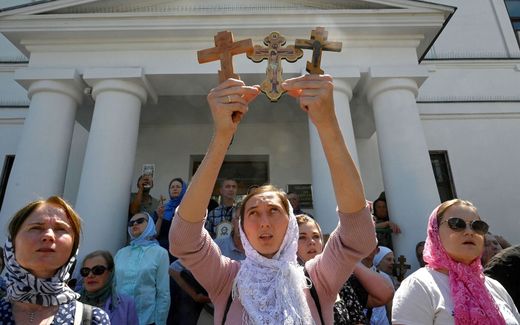 Supporters of the Ukrainian Orthodox Church (UOC) blocked access to the government's commission on Tuesday. Photo AFP, Sergei Chuzavkov
