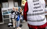 Demonstrants show support to Alex S. who was found guilty of assisting others in committing suicide. He sold poisonous drugs to people with a death wish. This is illegal in the Netherlands. The banners read "Boss over own life". Photo ANP, Rob Engelaar

