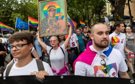 An image of the Virgin Mary is carried around during a pride parade. Photo AFP, Wojtek Radwanski
