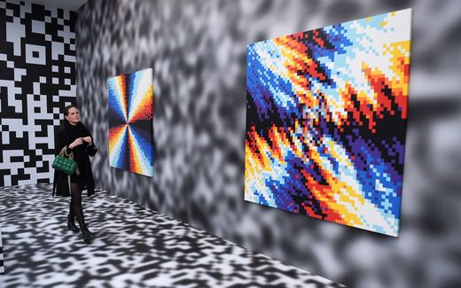 Artwork by Felipe Pantone at the 'Beyond the Streets' exhibition preview at the Saatchi Gallery in London. Photo EPA, Andy Rain