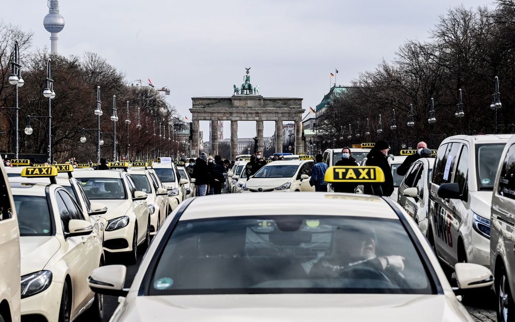 German taxi driver faces fine for driving around with Bible text 