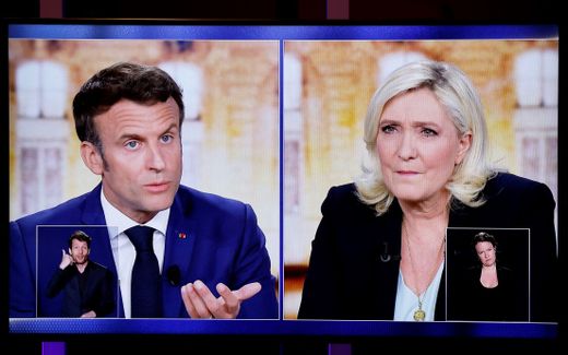 Emmanuel Macron and Marine Le Pen during the debate. PHoto AFP, Lucovic Marin