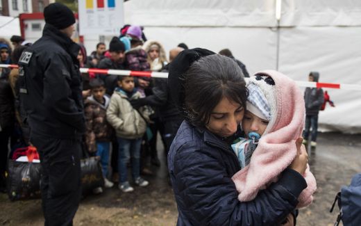 Refugee mother with child in Berlin. Photo AFP, Odd Andersen
