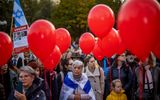 Demonstrators rally to show support for Israel in Prague. People hold red balloons during a demonstration in support of Israel, at the Old Town Square in Prague. Photo EPA, Martin Divisek
