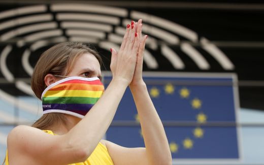 Members of European Parliament (MEPs) and LGBT supporters demonstrate their support for the LGBTQI community in front of Parliament during a plenary session in Brussels. Photo EPA, Olivier Hoslet