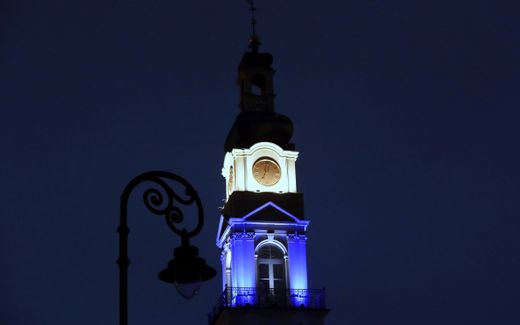 The tower of the Riga City Hall is illuminated in the colors of the Israeli national flag, in Riga, Latvia. Photo EPA, Toms Kalnins