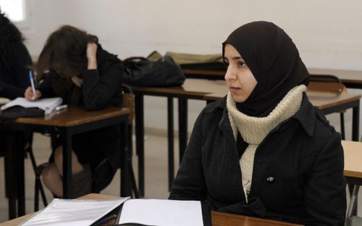 Muslim student wearing a headscarf. Photo AFP, Fethi Belaid

