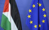 The Palestinian flag (L) is seen next to the European Union flag at the European Union Commission headquarters in Brussels. Photo AFP, Thierry Charlier
