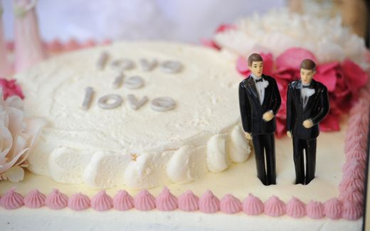 A wedding cake with a male couple. Photo AFP, Robyn Beck