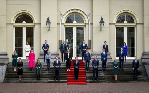 King Willem-Alexander and the fourth Rutte cabinet at the stairs of the Noordeinde Palace in the centre of The Hague. Photo EPA, Sem van der Wal