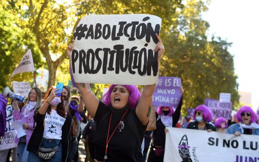 Spanish protest against prostitution. The board reads: "Abolish prostitution". Photo AFP, Oscar Del Pozo