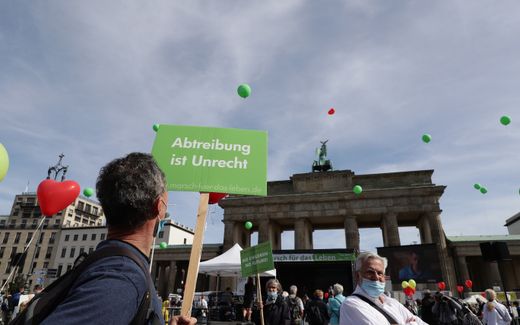 Pro-life march in Germany. The board reads "Abortion is injustice". Photo EPA, Hayoung Jeon 