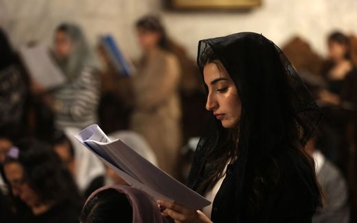 Palestinian Christians attend a mass at the Greek Orthodox church of Saint Porphyrius in Gaza City. Photo AFP, Omar Al-Qattaa