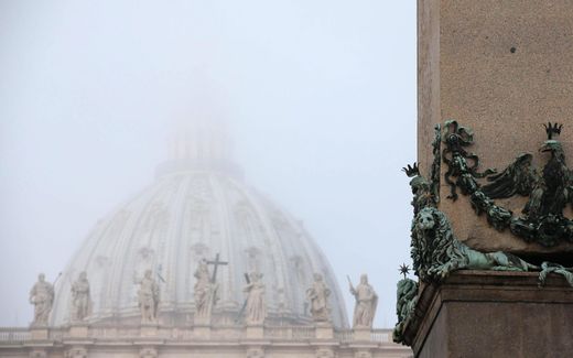 Fog covers the cupola of St. Peter's Basilica. Photo EPA, Alessandro di Meo