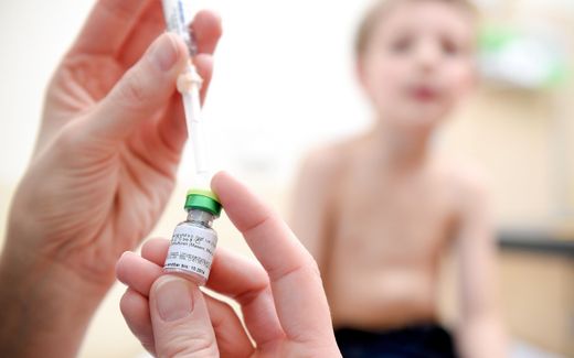 A German child receives his measles vaccination. Photo EPA, Sascha Steinbach