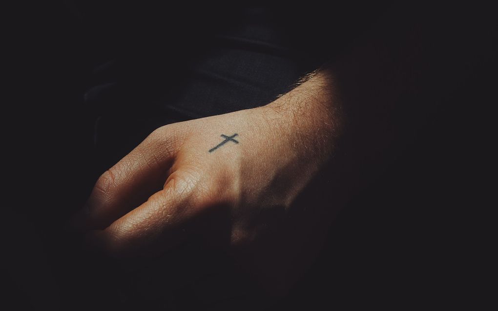 roman catholic symbols tattoos