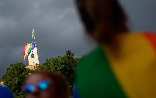 A rainbow flag is seen hanging from the Ljubljana Castle. Photo AFP, Jure Makovec