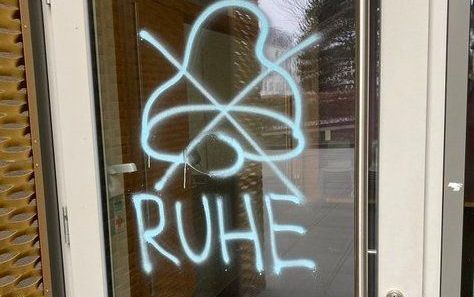 Graffiti on German church door because of dispute about bell ringing