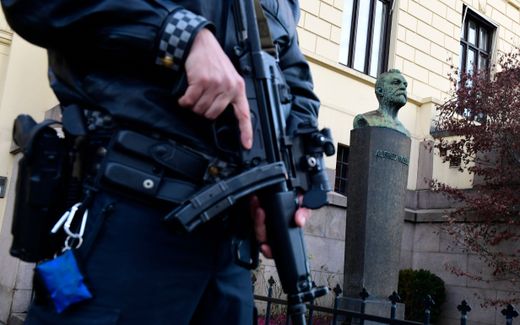 A Norwegian policeman secures the entrance of a building. photo AFP, Tobias Schwarz