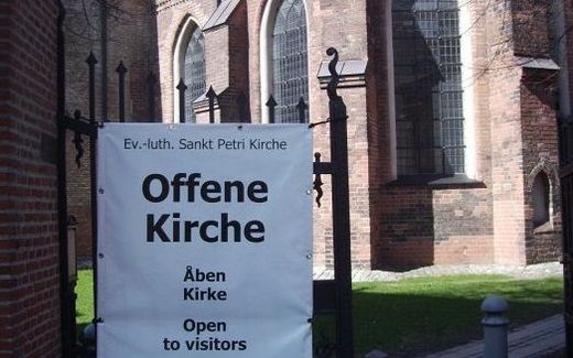 Welcome sign in front of the St Peter's Church, a German-language church in Denmark. Photo Facebook, Markus Löwe