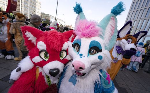 Two participants named "Christmas Now" and "Zurele" pose at the NordicFuzzCon in Malmo, Sweden. The NordicFuzzCon is one of the largest European gatherings of "furries" and cartoon animal enthusiasts. Photo EPA, Johan Nilsson 