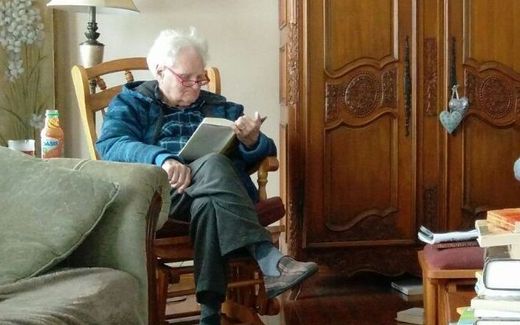 Grandpa reading in his chair. Photo Neline